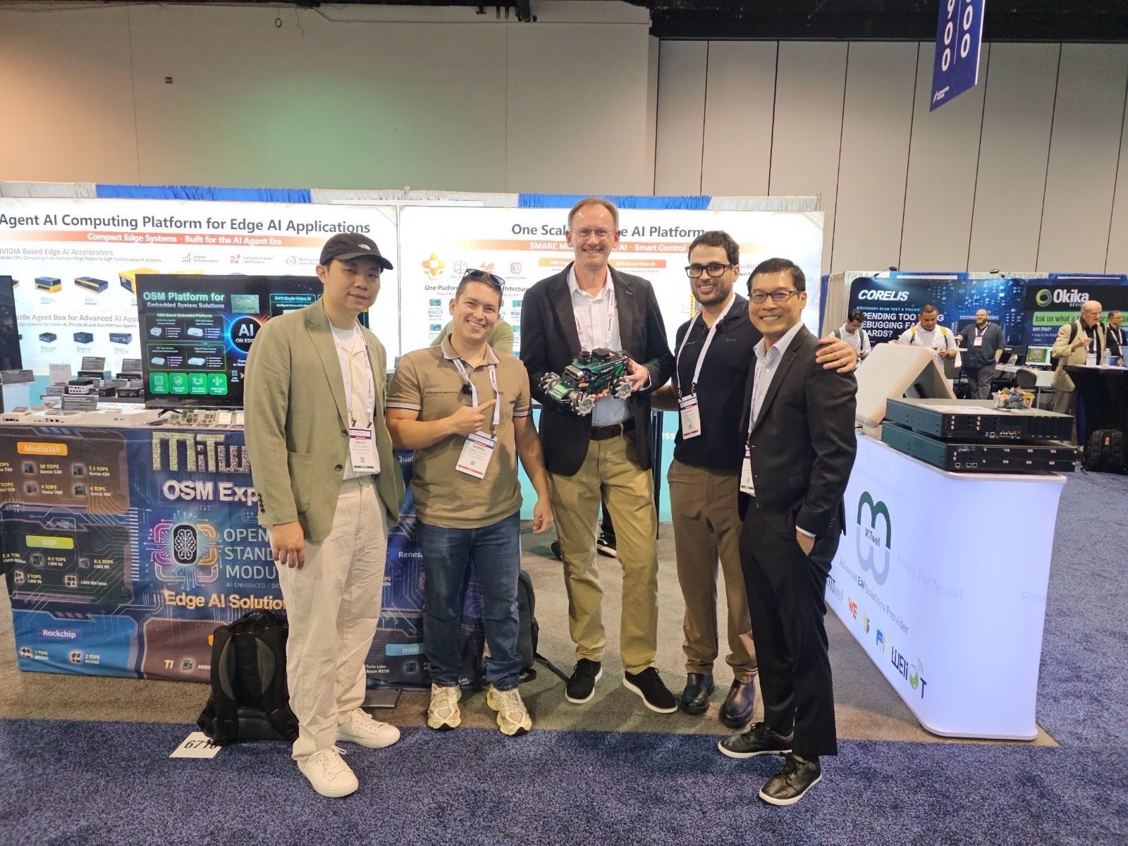 The ProventusNova team with the ROSOrin robot at the MiTwell booth at Embedded World North America, on the MediaTek Genio 520 platform